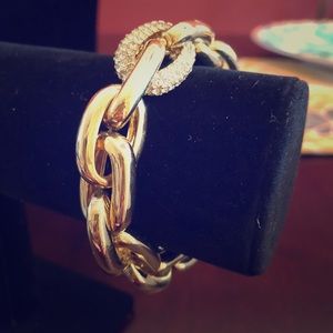 Gold chunky link bracelet with one crystal link